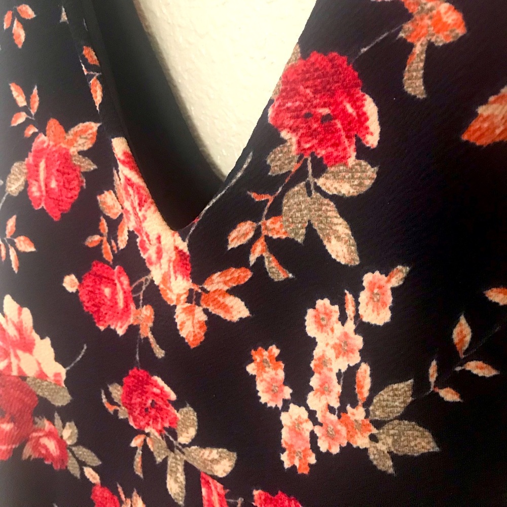 Lightly worn low cut floral midi dress.
